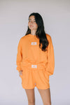 The Ava Airy Crewneck Go Vols Woven Label | Bright Orange