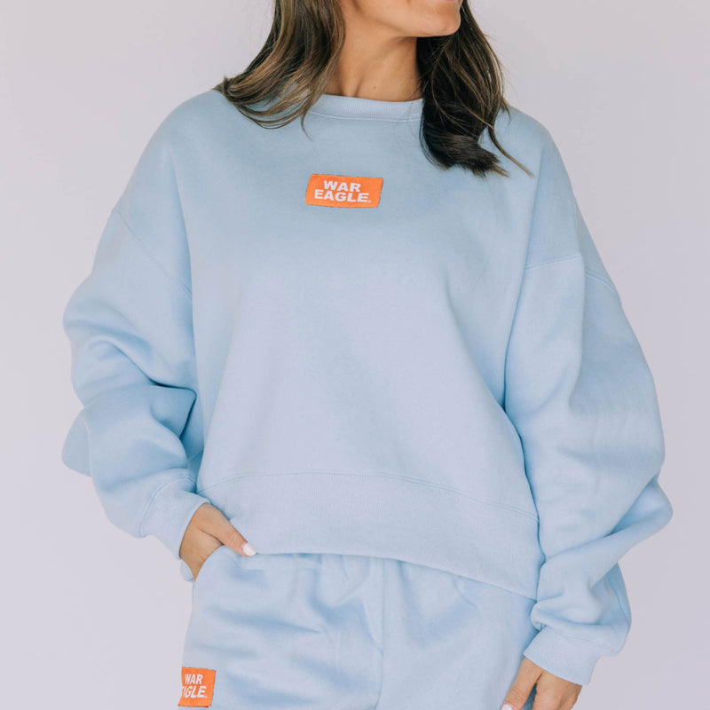 The Light Blue Becca Crewneck | War Eagle Woven Label
