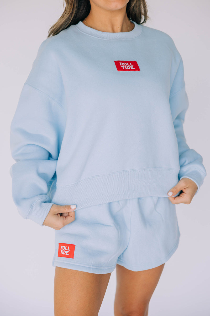 The Light Blue Becca Crewneck | Roll Tide Woven Label