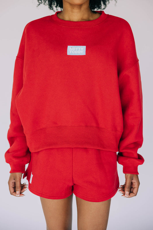 The Becca Boxy Crewneck Hotty Toddy Woven Label | Bright Red
