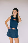 The Alli Tennis Skort War Eagle Woven Label | Navy