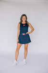 The Alli Tennis Skort Hotty Toddy Woven Label | Navy