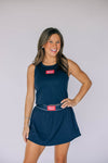 The Alli Tennis Skort Hotty Toddy Woven Label | Navy