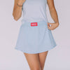 The Alli Tennis Skort Hotty Toddy Woven Label | Light Blue