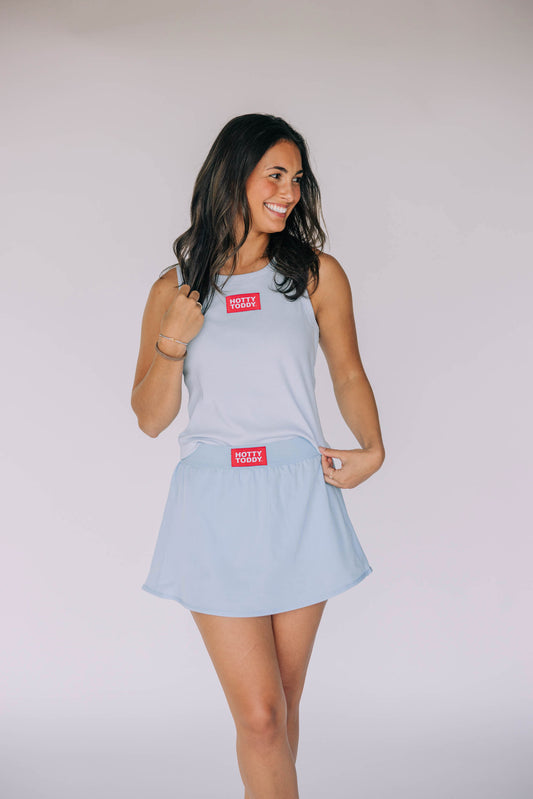 The Alli Tennis Skort Hotty Toddy Woven Label | Light Blue