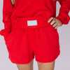 The Ava Airy Shorts Hotty Toddy Woven Label | Bright Red
