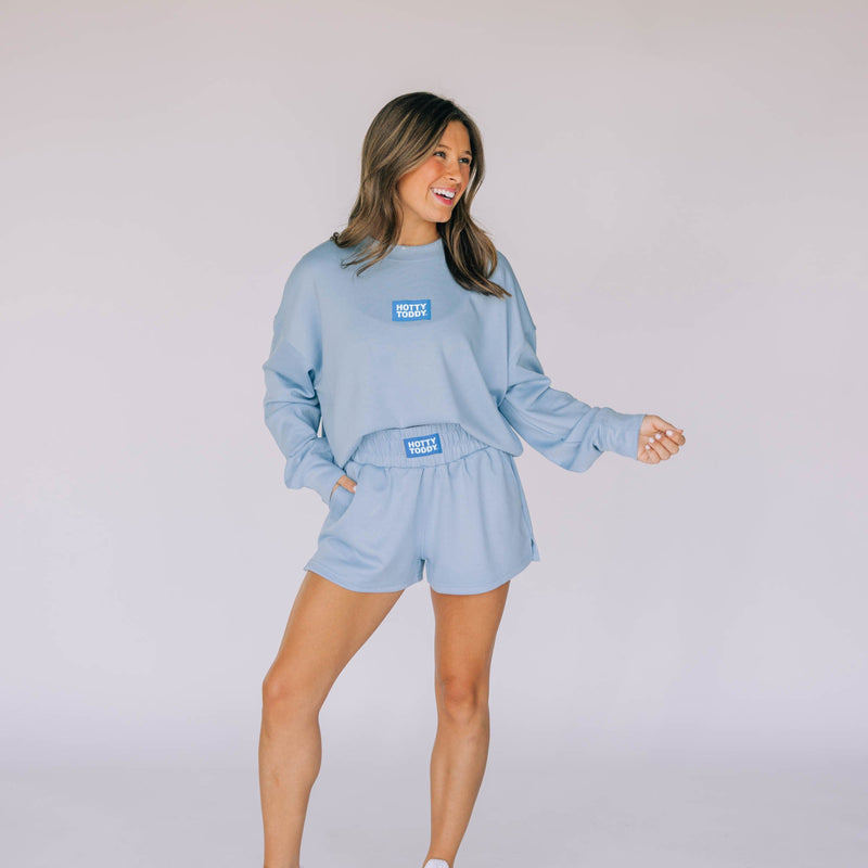 The Light Blue Ava Airy Crewneck | Hotty Toddy Woven Label