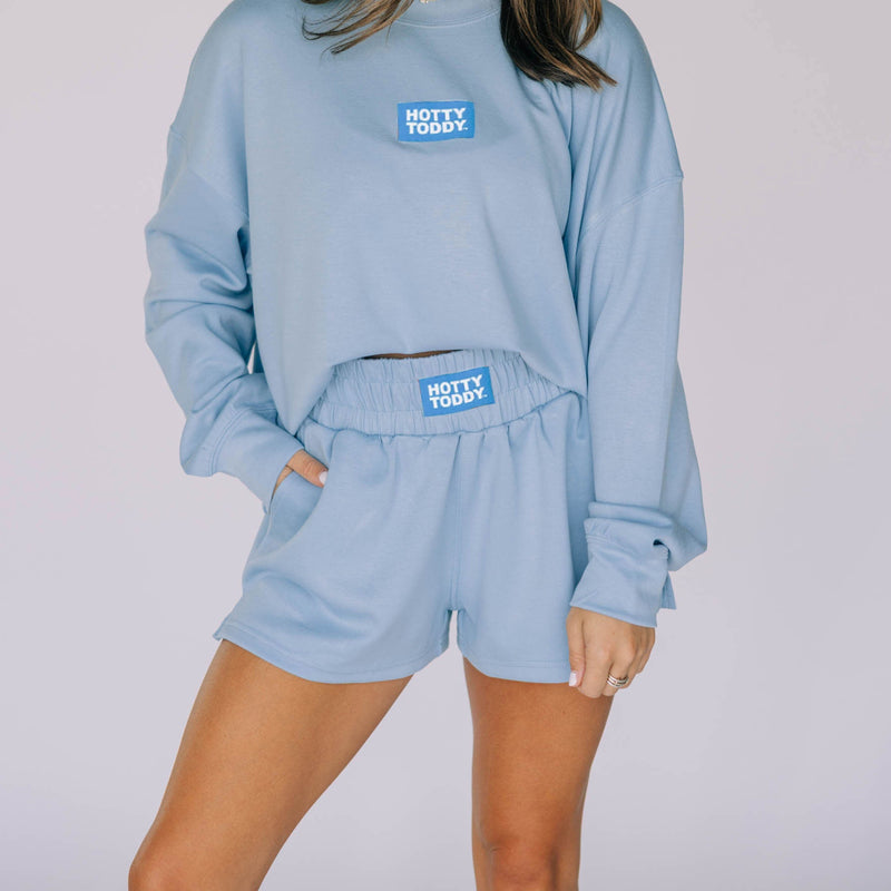 The Light Blue Ava Airy Crewneck | Hotty Toddy Woven Label