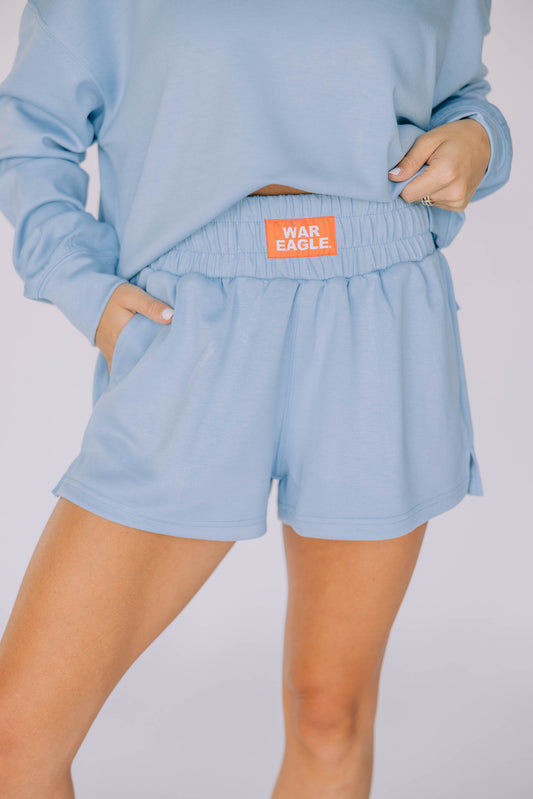 The Ava Airy Shorts War Eagle Woven Label | Light Blue