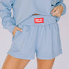 The Ava Airy Shorts Hotty Toddy Woven Label | Light Blue