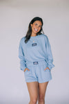 The Ava Airy Shorts War Eagle Woven Label | Light Blue