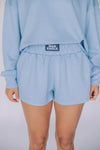 The Ava Airy Shorts War Eagle Woven Label | Light Blue