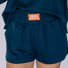 The Ava Airy Shorts War Eagle Woven Label | Navy
