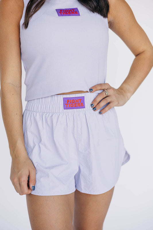 The Liz Nylon Shorts Fight Tigers Woven Label | Lavender