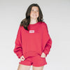 The Becca Boxy Crewneck Boomer Sooner Woven Label | Crimson