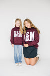 The Madi Varsity Mockneck A&M Applique | Youth Deep Maroon