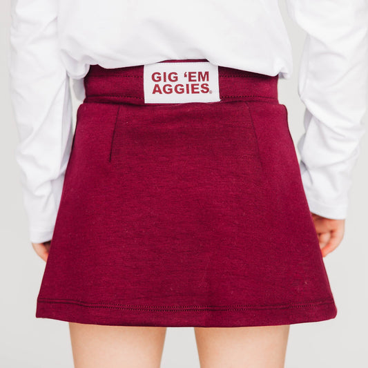 The Anna Active Skort Gig 'Em Aggies Woven Label | Youth Deep Maroon