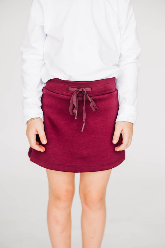 The Anna Active Skort Gig 'Em Aggies Woven Label | Youth Deep Maroon