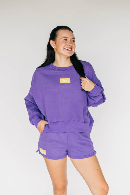 The Becca Boxy Crewneck Geaux Tigers Woven Label | Purple