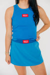 The Alli Tennis Skort Hotty Toddy Woven Label | Powder Blue