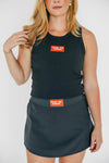 The Alli Tennis Skort Hook 'Em Horns Woven Label | Graphite