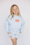 The Becca Boxy Crewneck War Eagle Woven Label | Youth Light Blue