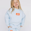 The Becca Boxy Crewneck War Eagle Woven Label | Youth Light Blue