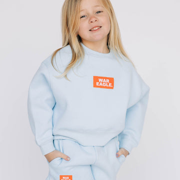 The Becca Boxy Crewneck War Eagle Woven Label | Youth Light Blue