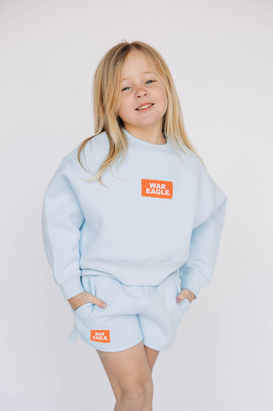 The Becca Shorts War Eagle Woven Label | Youth Light Blue