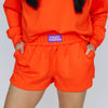 The Ava Airy Shorts Fight Tigers Woven Label | Orange