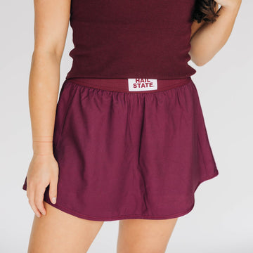 The Alli Tennis Skort Hail State Woven Label | Deep Maroon
