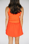 The Alli Tennis Skort Fighting Gators Woven Label | Orange