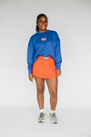 The Ava Airy Crewneck Fighting Gators Woven Label | Royal