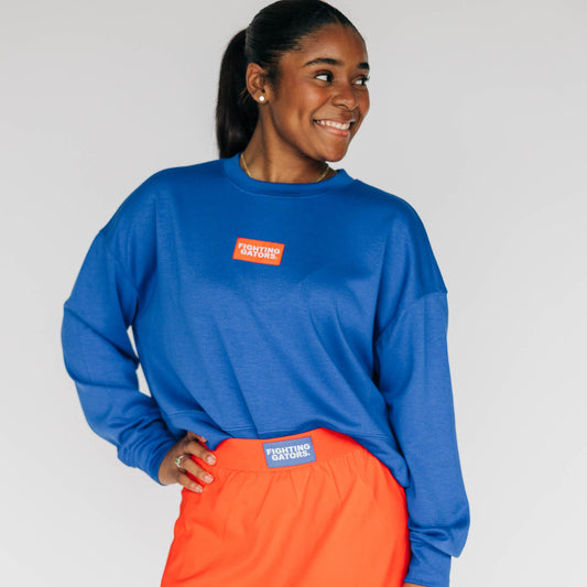 The Ava Airy Crewneck Fighting Gators Woven Label | Royal