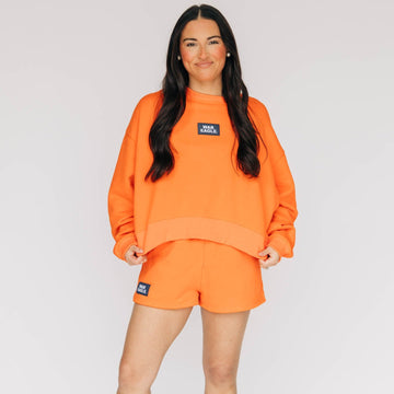 The Becca Boxy Crewneck War Eagle Woven Label | Orange