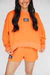The Becca Boxy Crewneck War Eagle Woven Label | Orange
