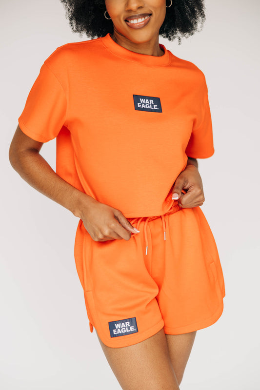 The Kristen Airy Tee War Eagle Woven Label | Orange