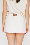 The Anna Active Skort War Eagle Woven Label | Bone