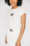 The Raegan Ribbed Baby Tee War Eagle Woven Label | Bone