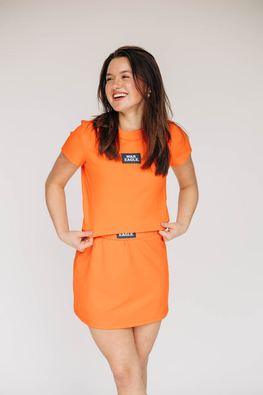 The Raegan Ribbed Baby Tee War Eagle Woven Label | Orange