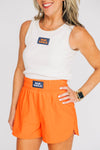 The Liz Nylon Shorts War Eagle Woven Label | Orange