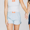 The Liz Nylon Shorts War Eagle Woven Label | Light Blue