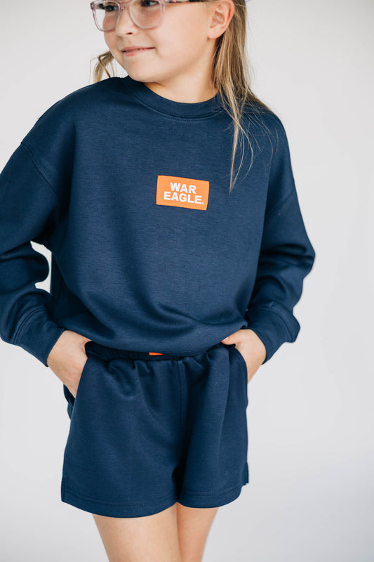 The Ava Airy Crewneck War Eagle Woven Label | Youth Navy