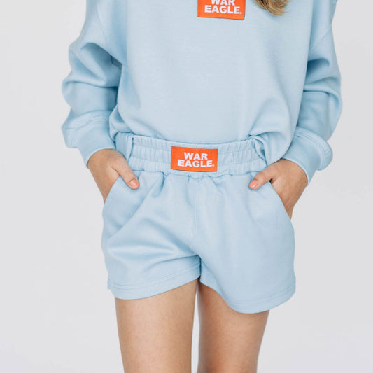 The Ava Airy Shorts War Eagle Woven Label | Youth Light Blue