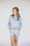 The Ava Airy Crewneck War Eagle Woven Label | Youth Light Blue