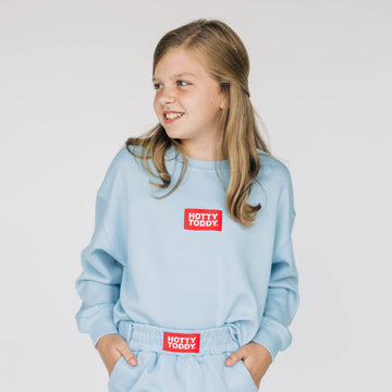 The Ava Airy Crewneck Hotty Toddy Woven Label | Youth Light Blue