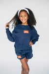 The Becca Boxy Crewneck War Eagle Woven Label | Youth Navy