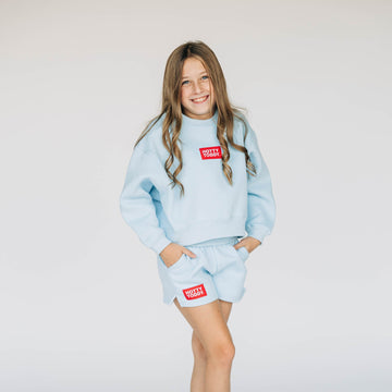 The Becca Boxy Crewneck Hotty Toddy Woven Label | Youth Light Blue