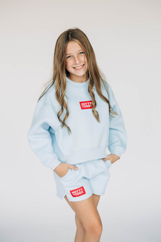 The Becca Boxy Crewneck Hotty Toddy Woven Label | Youth Light Blue