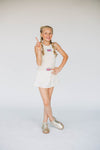 The Alli Tennis Skort Hotty Toddy Woven Label | Youth Bone